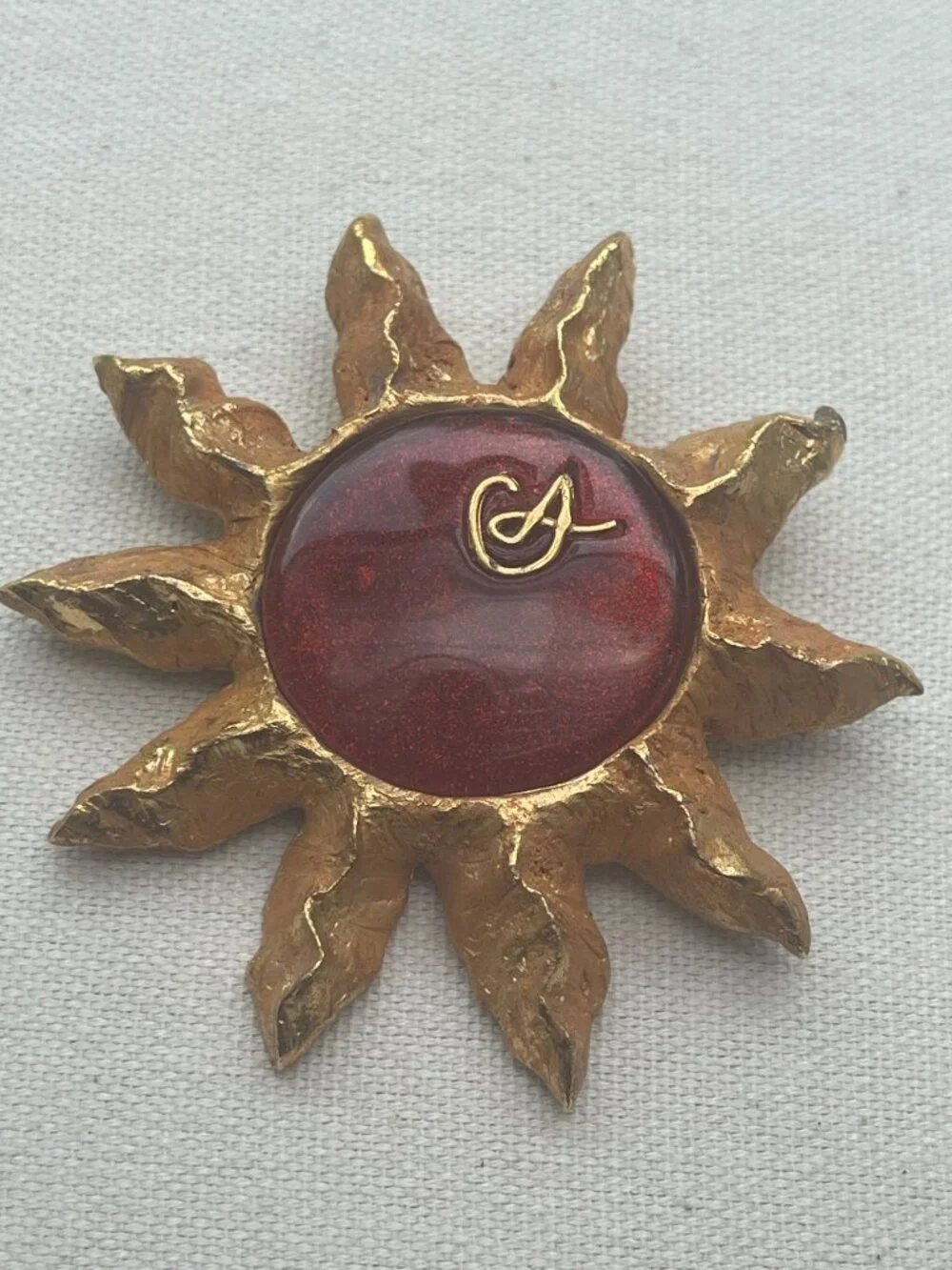 Christian Lacroix Gold-Tone Sun Brooch W/ Red Resin Center & Golden Logo